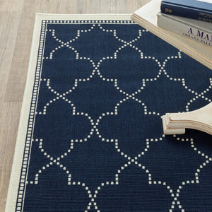 4' X 6' Blue and Ivory Geometric Stain Resistant Indoor Outdoor Area Rug