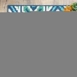 5' X 8' Blue and Ivory Geometric Stain Resistant Indoor Outdoor Area Rug