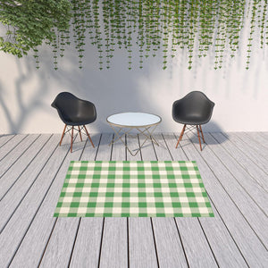 5' X 8' Green and Ivory Geometric Stain Resistant Indoor Outdoor Area Rug