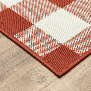 7' X 10' Red and Ivory Geometric Stain Resistant Indoor Outdoor Area Rug