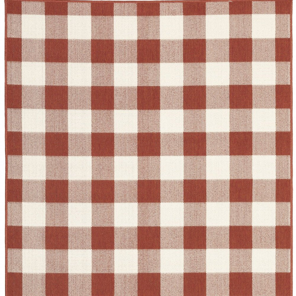 7' X 10' Red and Ivory Geometric Stain Resistant Indoor Outdoor Area Rug