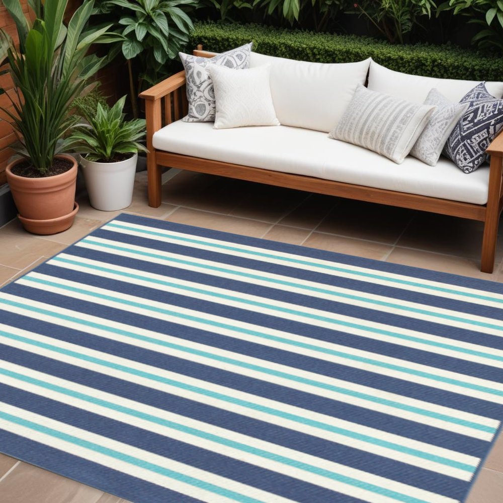 7' X 10' Blue and Ivory Geometric Stain Resistant Indoor Outdoor Area Rug