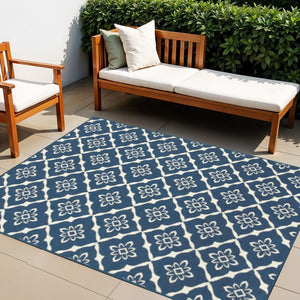 4' X 6' Blue and Ivory Floral Stain Resistant Indoor Outdoor Area Rug