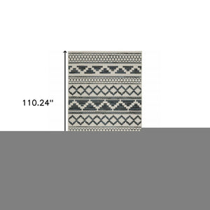 7' X 9' Blue and Beige Geometric Stain Resistant Indoor Outdoor Area Rug