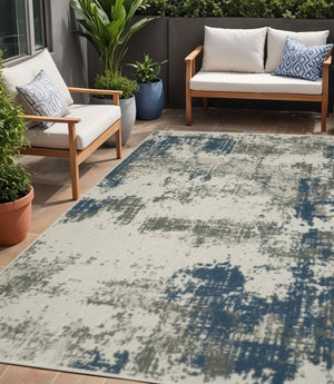 5' X 7' Blue and Beige Abstract Stain Resistant Indoor Outdoor Area Rug