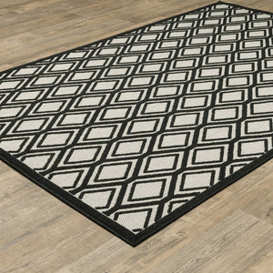 8' X 10' Beige and Black Geometric Stain Resistant Indoor Outdoor Area Rug