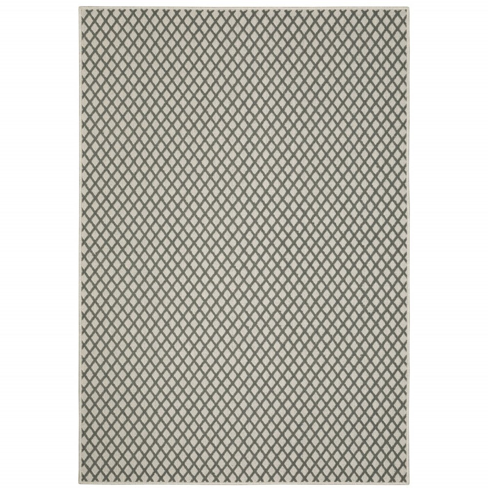 5' X 7' Beige Geometric Stain Resistant Indoor Outdoor Area Rug