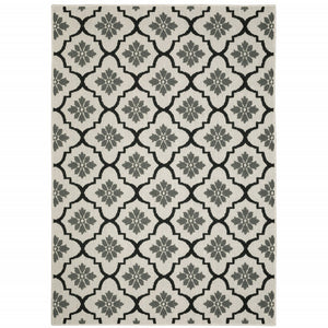 7' X 9' Beige and Black Geometric Stain Resistant Indoor Outdoor Area Rug
