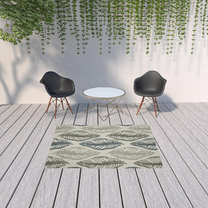 5' X 7' Beige Floral Stain Resistant Indoor Outdoor Area Rug