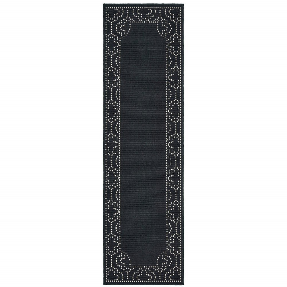 2' X 8' Black and Ivory Stain Resistant Indoor Outdoor Area Rug