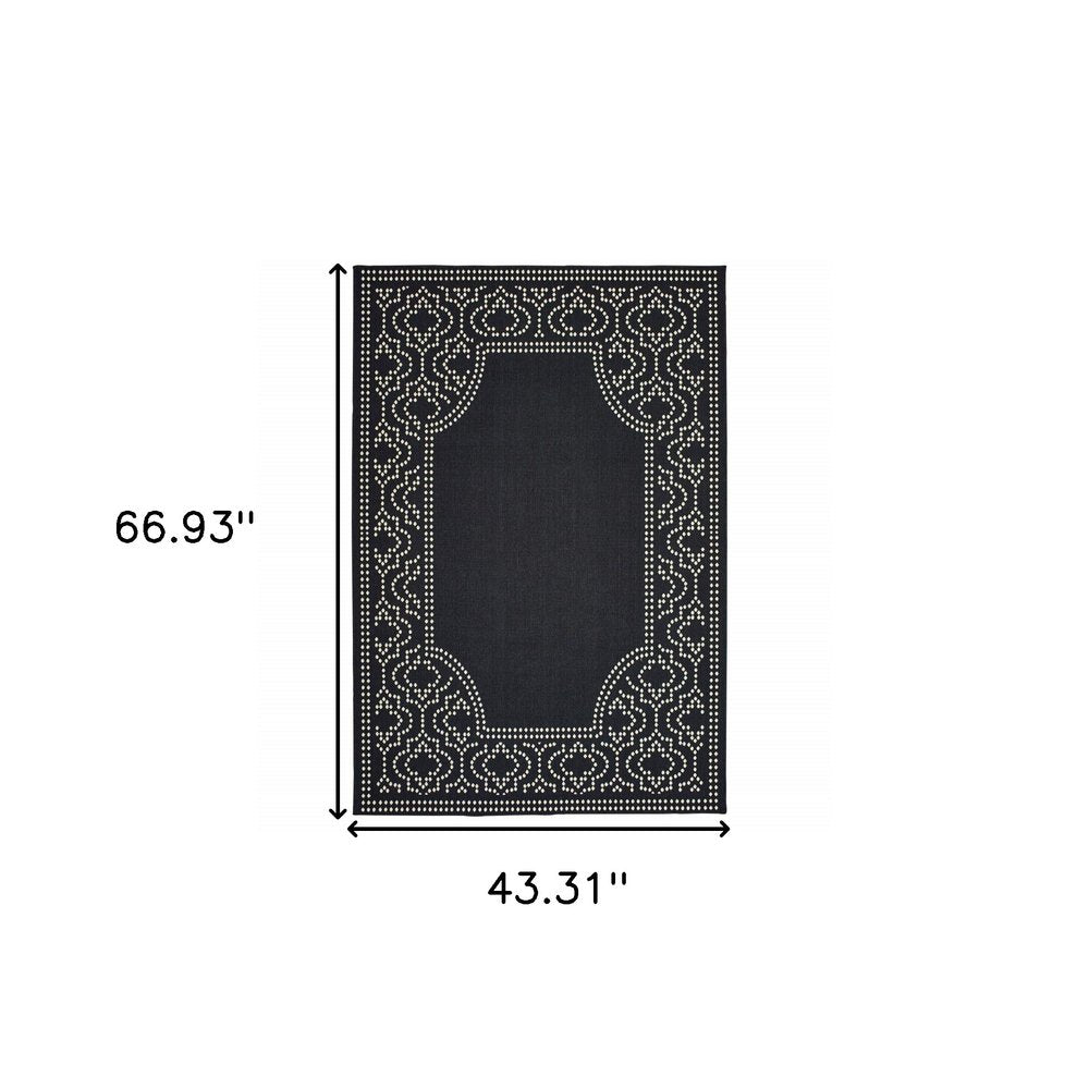 4' X 6' Black and Ivory Stain Resistant Indoor Outdoor Area Rug