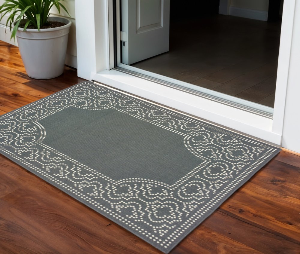 2' X 4' Gray and Ivory Stain Resistant Indoor Outdoor Area Rug