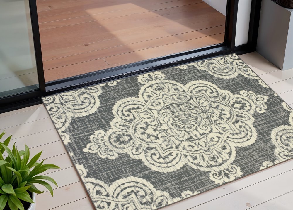 2' X 4' Gray and Ivory Oriental Stain Resistant Indoor Outdoor Area Rug