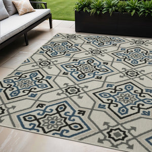 5' X 7' Blue and Beige Oriental Stain Resistant Indoor Outdoor Area Rug