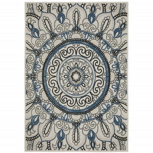 2' X 4' Blue and Beige Geometric Stain Resistant Indoor Outdoor Area Rug