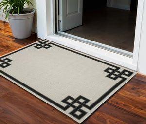 3' X 5' Beige and Black Stain Resistant Indoor Outdoor Area Rug