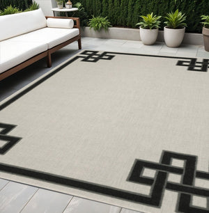 5' X 7' Beige and Black Stain Resistant Indoor Outdoor Area Rug