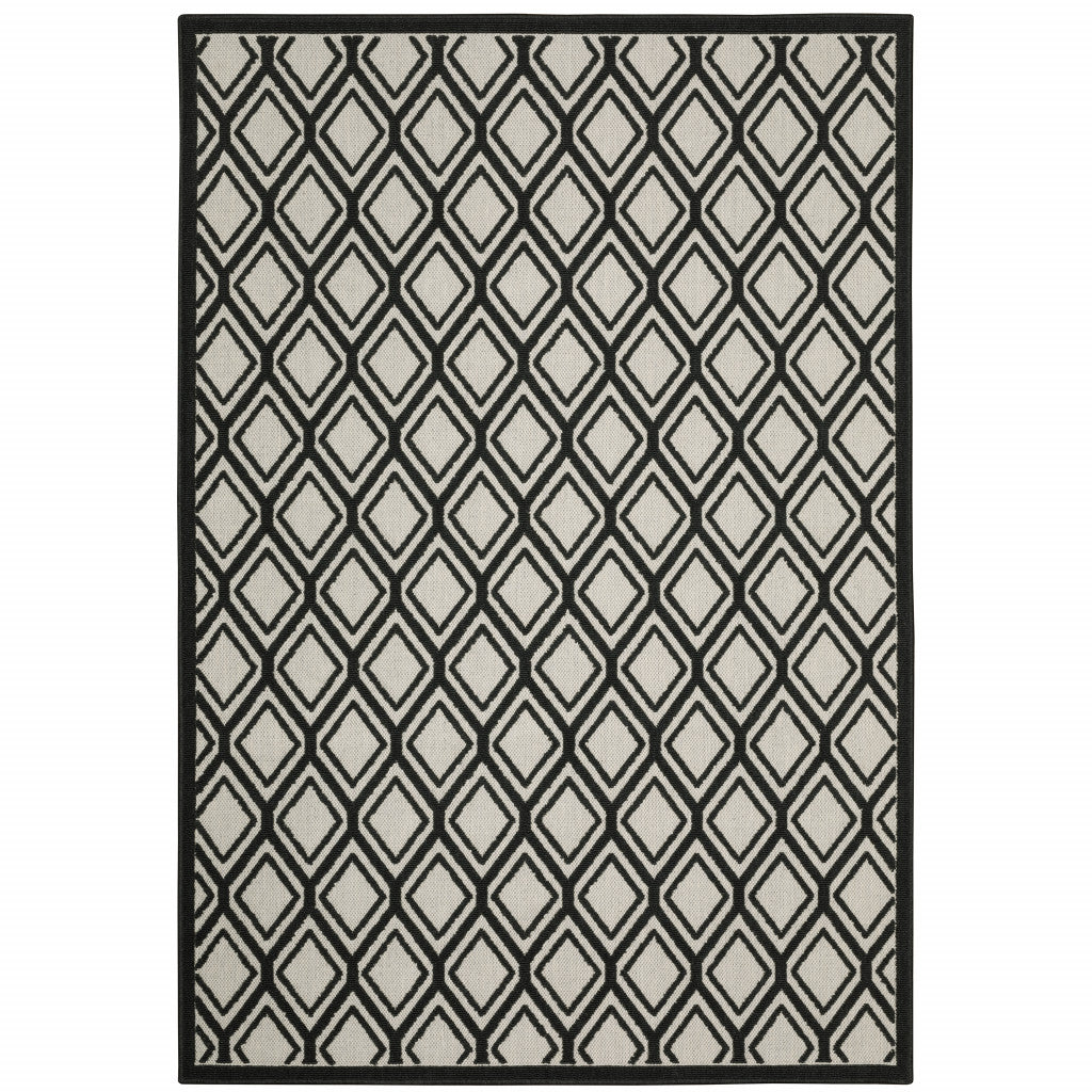 2' X 4' Beige and Black Geometric Stain Resistant Indoor Outdoor Area Rug