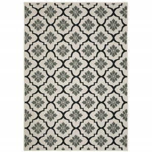 2' X 4' Beige and Black Geometric Stain Resistant Indoor Outdoor Area Rug