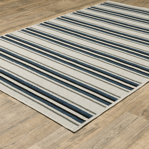 2' X 4' Blue and Beige Geometric Stain Resistant Indoor Outdoor Area Rug