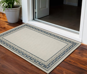 2' X 4' Blue and Beige Stain Resistant Indoor Outdoor Area Rug