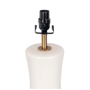 The Cascade Lamp Base Table Lamp features a glossy white ceramic body, a brass-colored neck, and a black socket designed for light bulbs. Its smooth surface enhances its modern appeal against a plain white background.