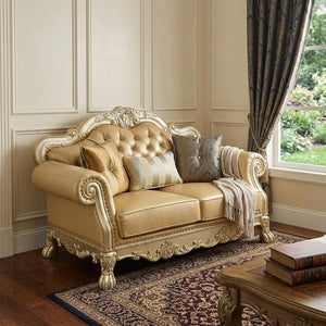 64" Bone And Gold Faux Leather Loveseat and Toss Pillows