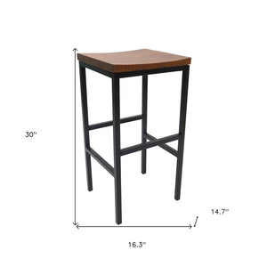 30" Chestnut And Black Solid Wood And Steel Backless Bar Height Swivel Bar Chair