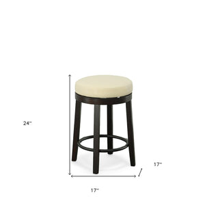 Set of Two 24" Cream and Espresso Faux Leather and Solid Wood Backless Counter Height Swivel Bar Chairs