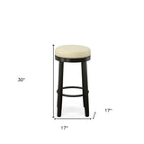 Set of Two 30" Cream and Espresso Faux Leather and Solid Wood Backless Bar Height Swivel Bar Chairs