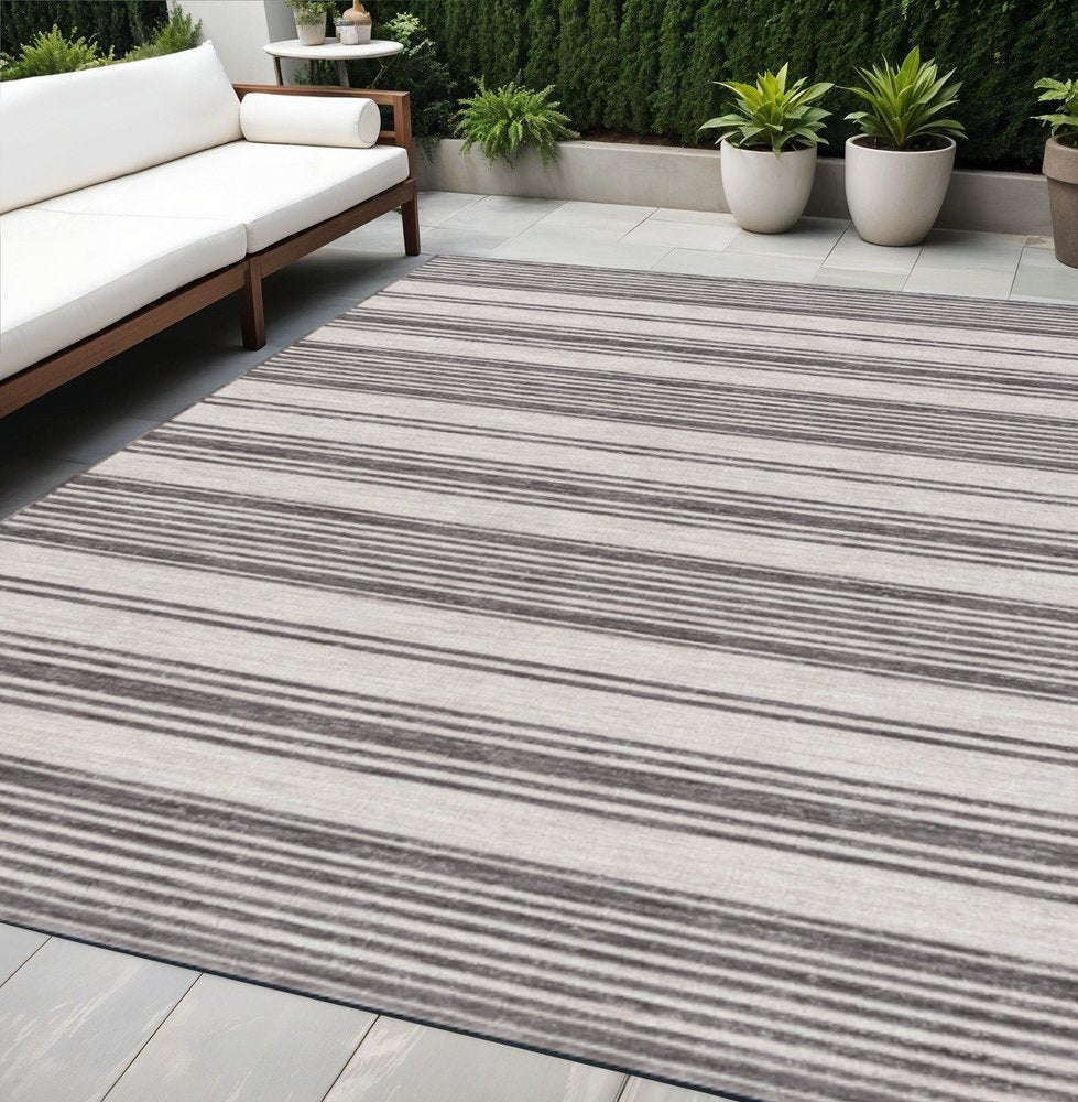 5' X 7' Gray And Ivory Striped Indoor Outdoor Area Rug