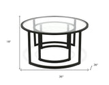Set of Two Black Glass And Steel Round Sled Nested Coffee Tables
