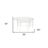 Set of Two 36" White Glass And Steel Round Nested Coffee Tables