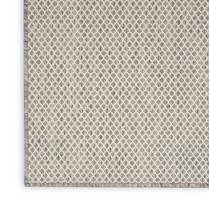 7' X 10' Ivory And Silver Indoor Outdoor Area Rug