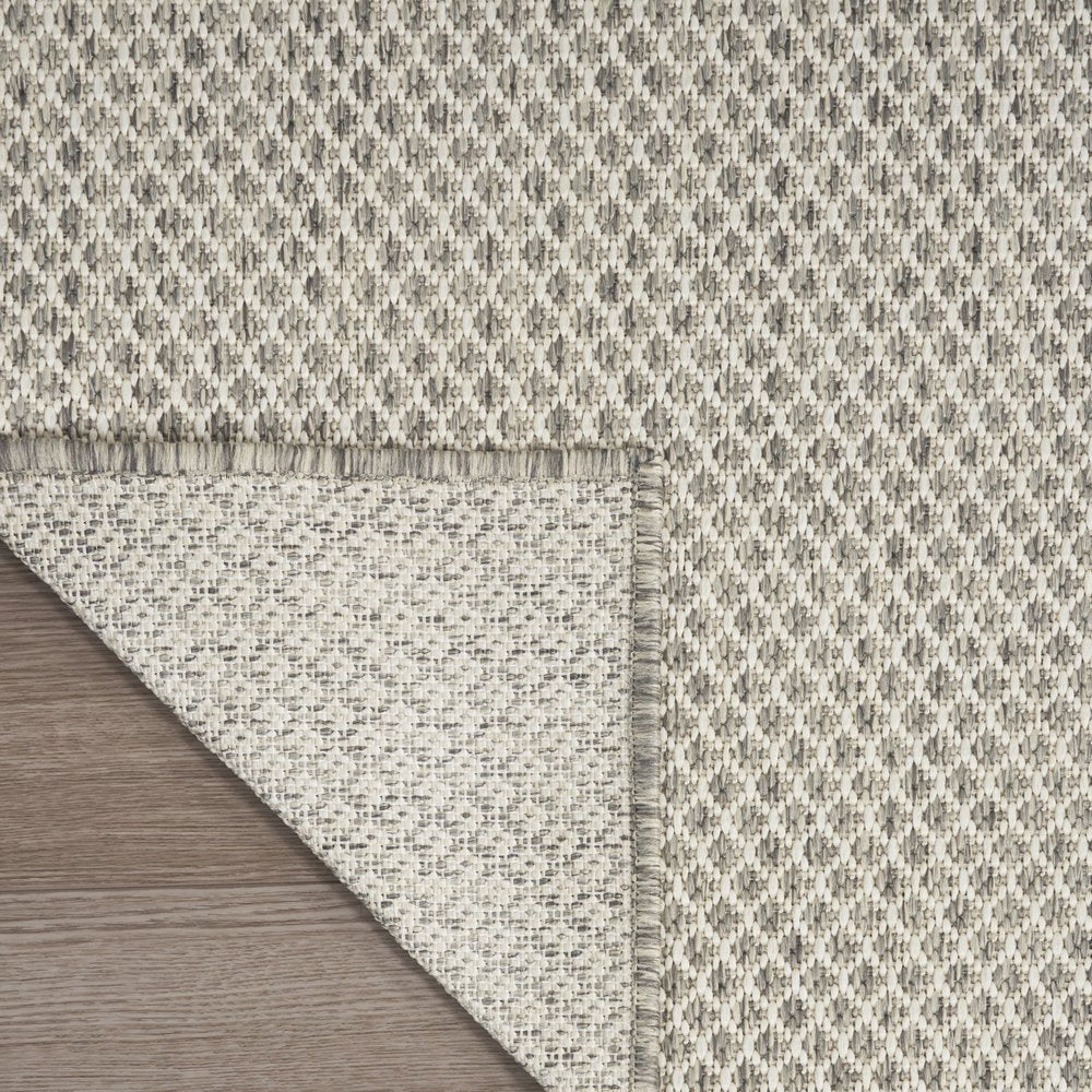 7' X 10' Ivory And Silver Indoor Outdoor Area Rug