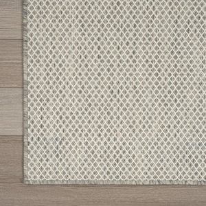 7' X 10' Ivory And Silver Indoor Outdoor Area Rug