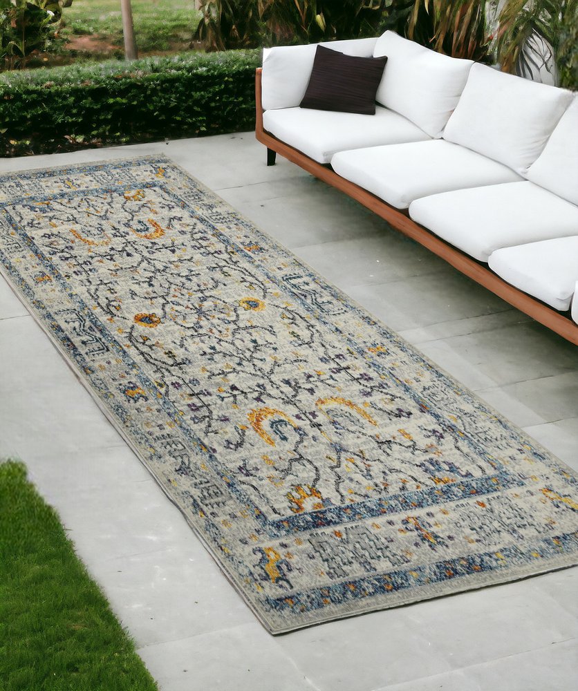 8' Ivory And Yellow Oriental Distressed Runner Rug