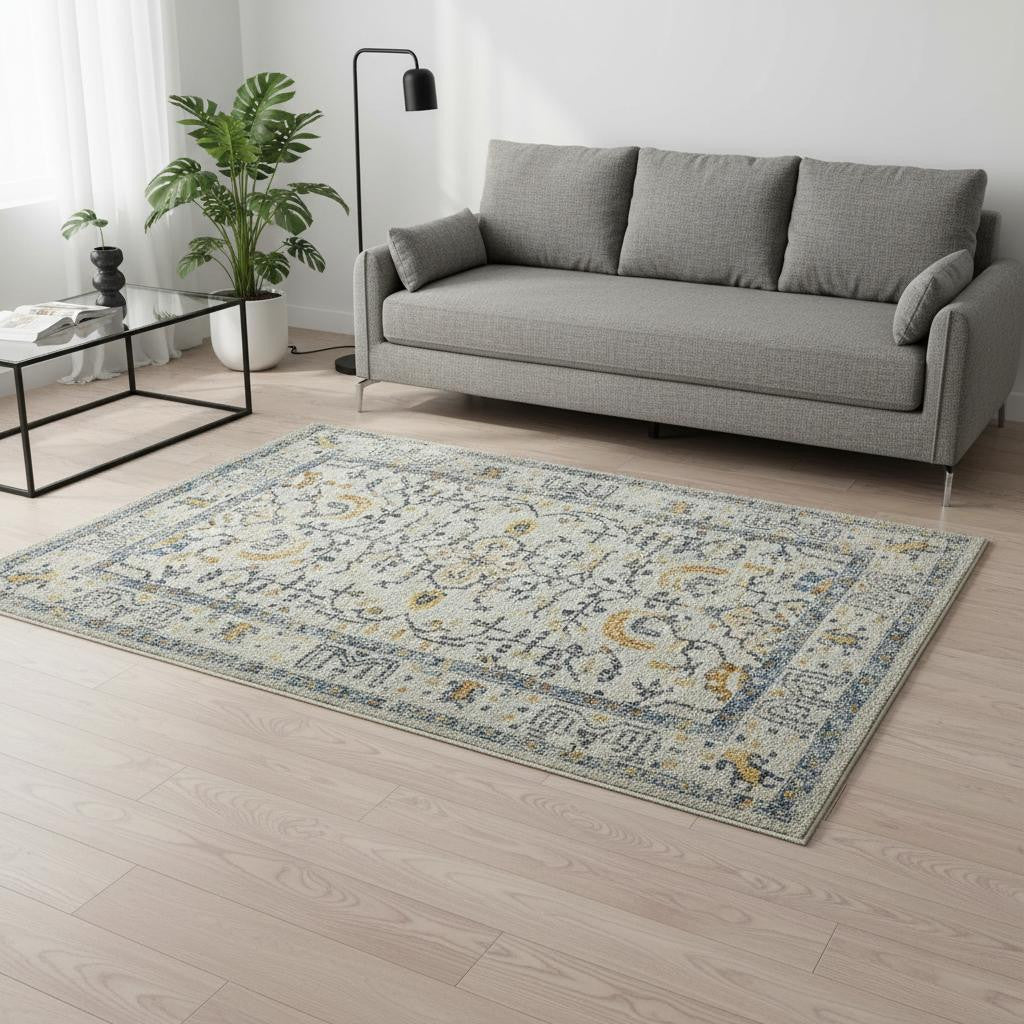 5' X 8' Ivory And Yellow Oriental Distressed Area Rug