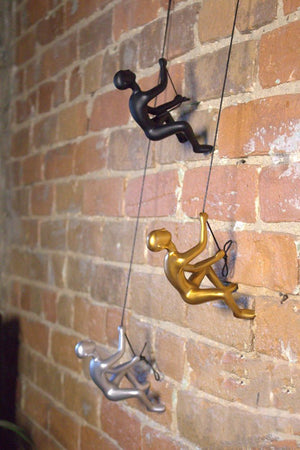Set of Two Gold Resin Climbing Man Hanging Dimensional Sculpture