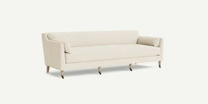 The Leonelle Sofa, in cream color with three seats, straight arms, and wooden legs, is showcased against a plain white background. It features a minimalist design with comfortable cushions and a subtle texture.