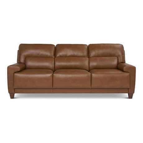 The Draper Sofa is a brown leather piece featuring three cushioned seats and matching armrests, all supported by short wooden legs. It boasts a sleek, modern design that looks both comfortable and spacious.