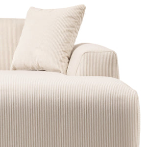 Close-up of the Mar - High-Quality Sectional Sofa in cream-colored textured corduroy with a matching cushion. The ribbed fabric gives a plush look, showing the armrest and seating area against a plain white background.