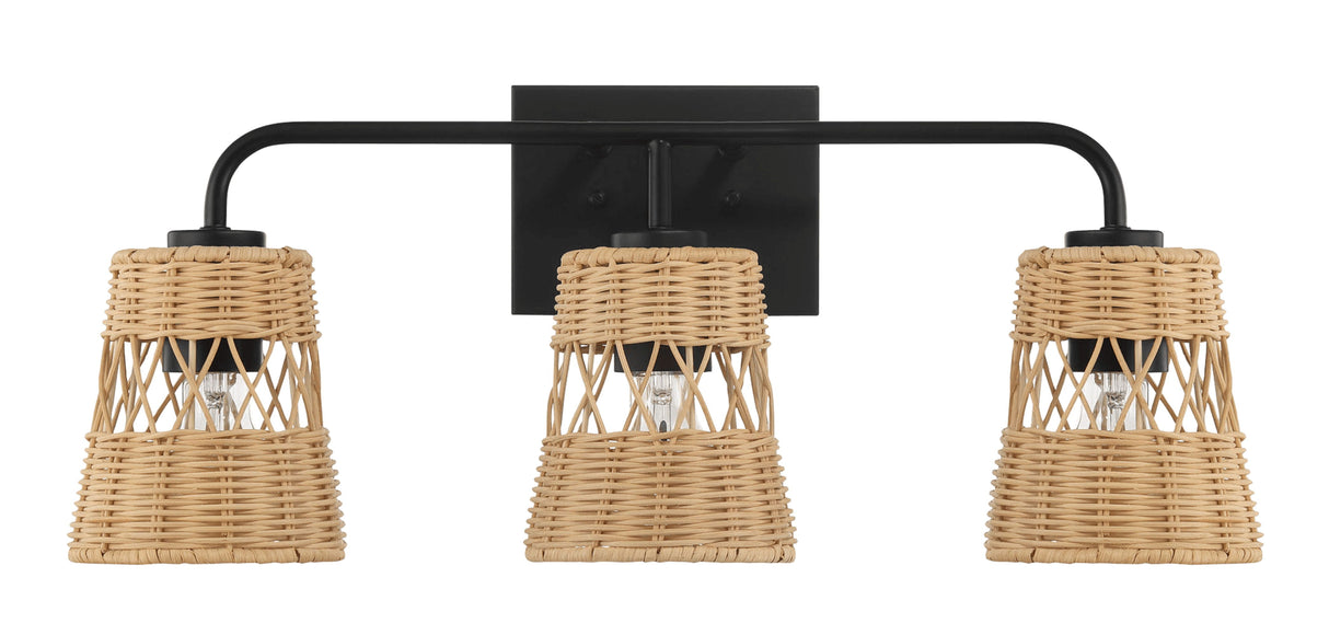 The Moonlit 3 Lights Wall Sconce features a black metal frame and woven rattan cylindrical shades with a lattice pattern, offering a warm, natural look while partially revealing the bulbs for your bathroom lighting over the mirror.