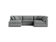 A stylish Bryant U-Sofa Bumper Sectional in gray, featuring plush cushions and a left-hand chaise, set against a solid black background.