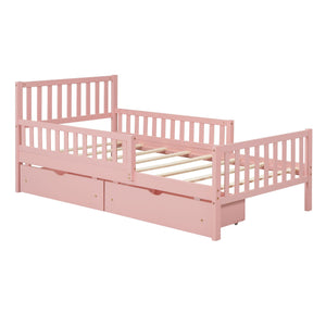 The Platform Bed features a pink wooden design with slatted headboard and footboard. It includes guardrails on both sides for safety and two under-bed storage drawers, offering a simple and modern style ideal for a child's room.