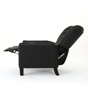 The Modern Push Back Recliner is depicted in a side view, showcasing its black tufted backrest and extended footrest. Its sleek design features nailhead trim along the edges, all set against a plain white background.