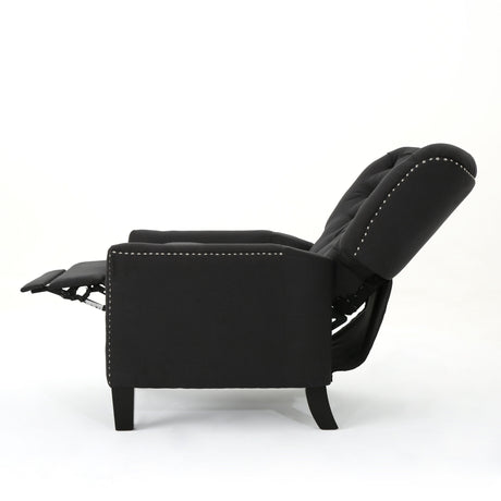 The Modern Push Back Recliner is depicted in a side view, showcasing its black tufted backrest and extended footrest. Its sleek design features nailhead trim along the edges, all set against a plain white background.