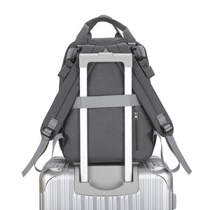 Multi-functional Diaper Bag With A Baby Changing Pad And A Warming Compartment