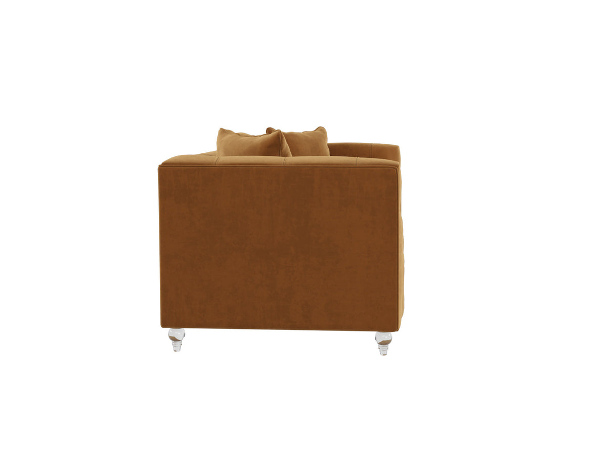 Side view of the Bea Velvet Tufted Sofa in brown, accompanied by two matching cushions and featuring clear acrylic legs, against a white background.