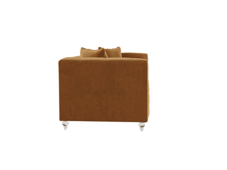 Side view of the Bea Velvet Tufted Sofa in brown, accompanied by two matching cushions and featuring clear acrylic legs, against a white background.